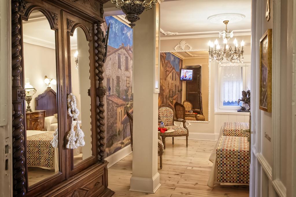 Hostal Boutique Puerta Del Sol Торрелавега Номер фото